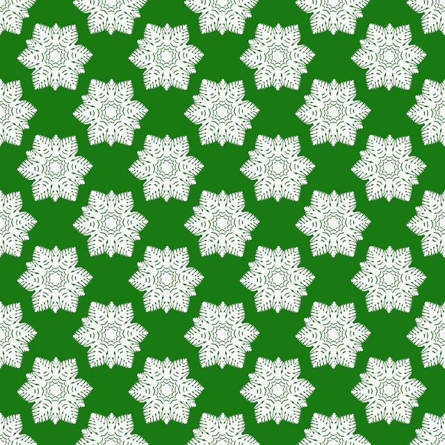 Twelve double-sided sheets of sage and cream botanical patterned paper with line-drawn ferns, shown with one sheet flipped to reveal a fine tonal linen texture
